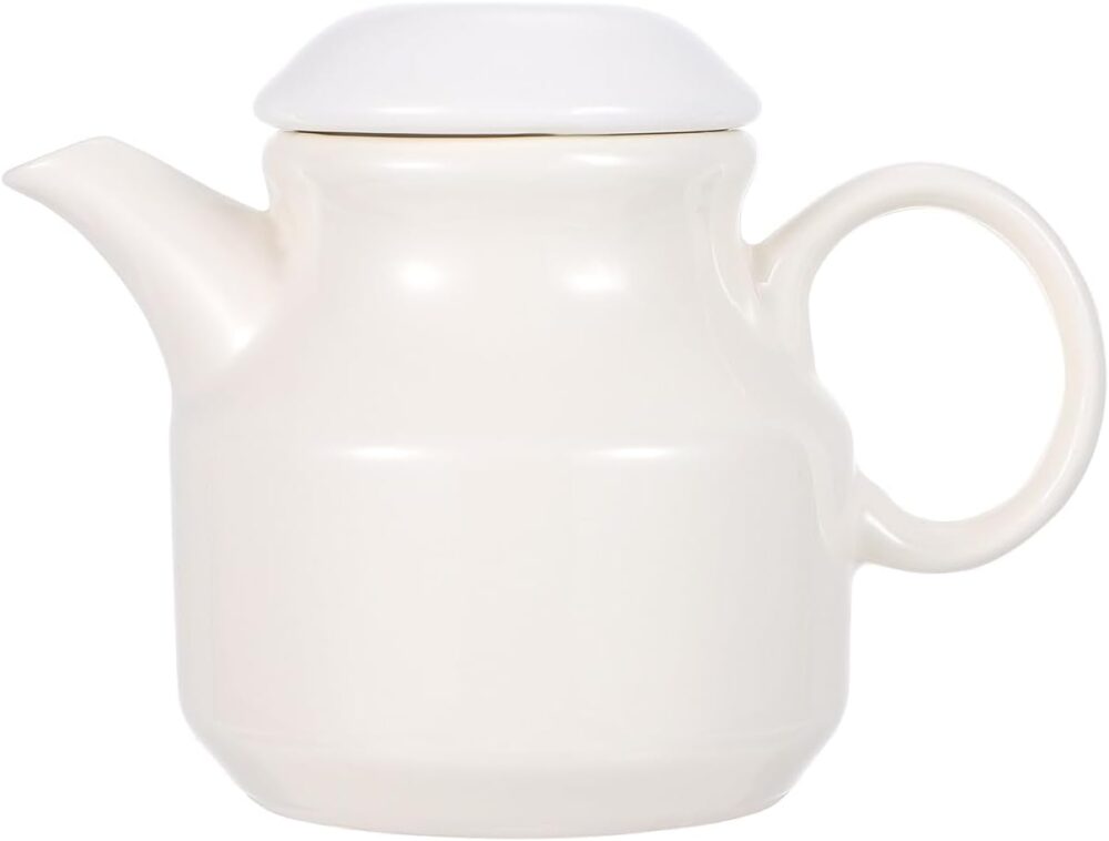 Jarra para creme com alça de cerâmica branca com creme para ...